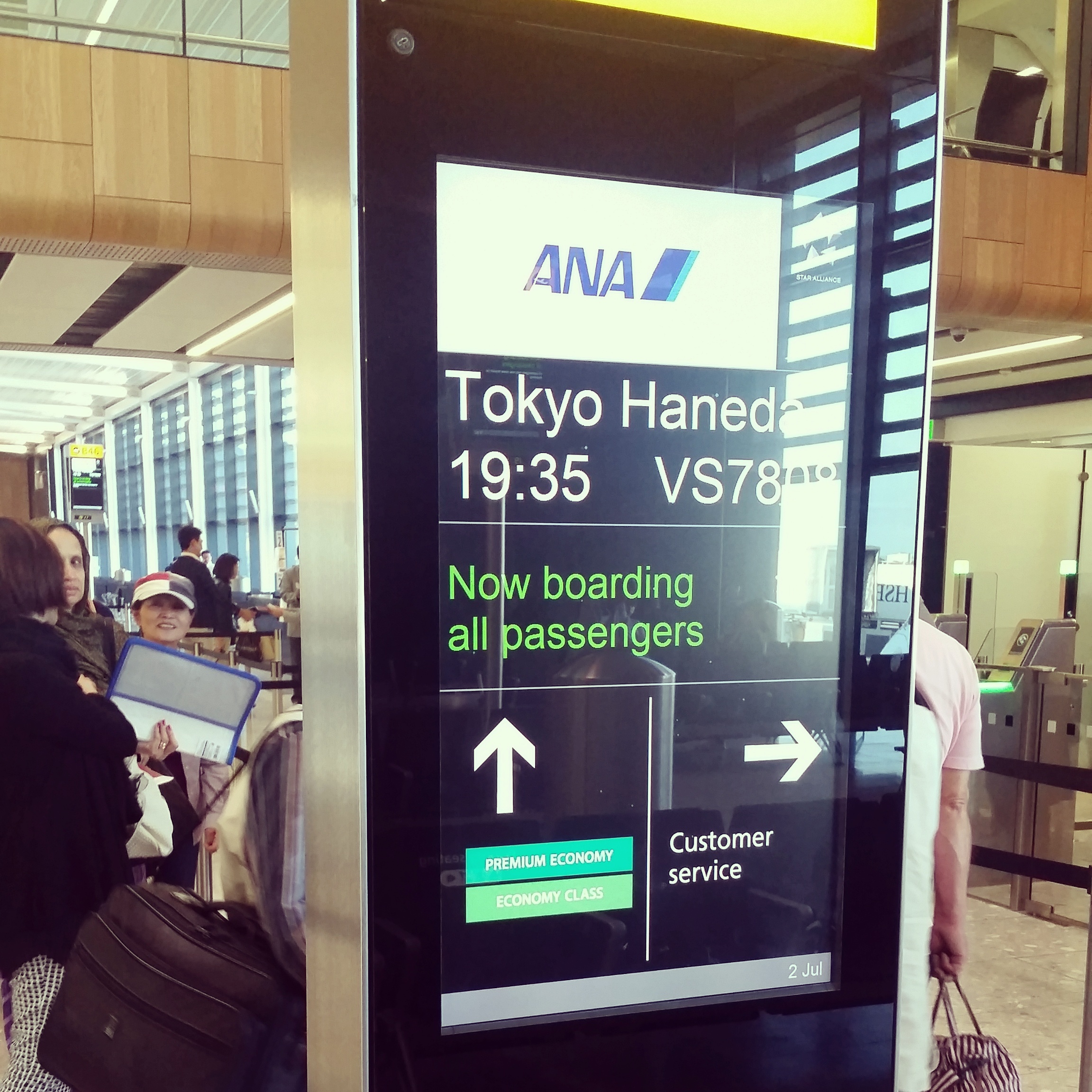 Sign for Tokyo Haneda at Heathrow Airport gate