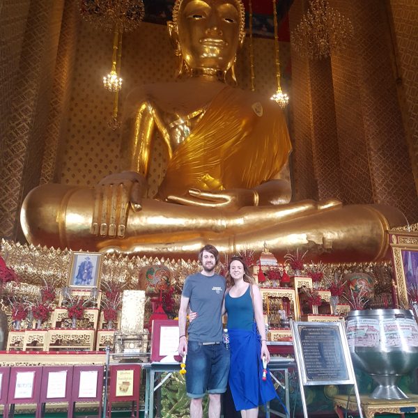 With the giant seated Buddah